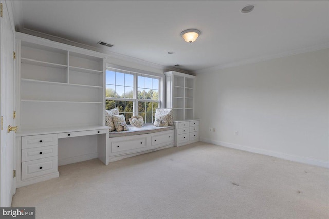 unfurnished bedroom featuring ornamental molding and light carpet