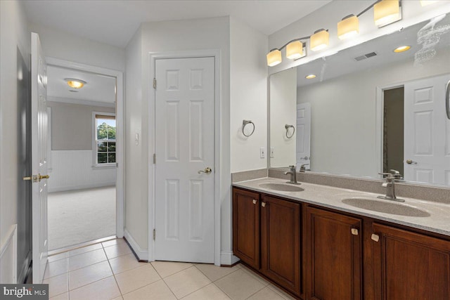 bathroom with vanity and tile patterned floors