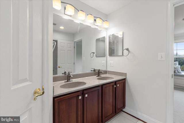 bathroom with vanity and tile patterned floors