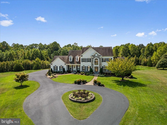 view of front of property with a front lawn