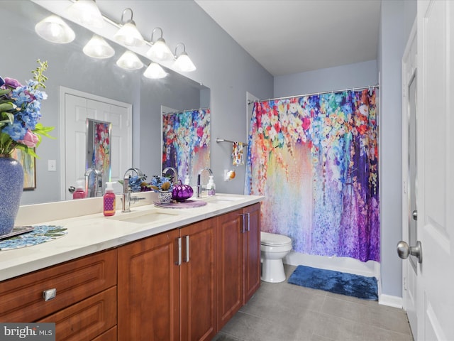 full bathroom featuring shower / tub combo, tile patterned floors, vanity, and toilet