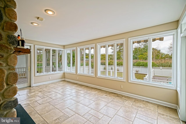 view of unfurnished sunroom