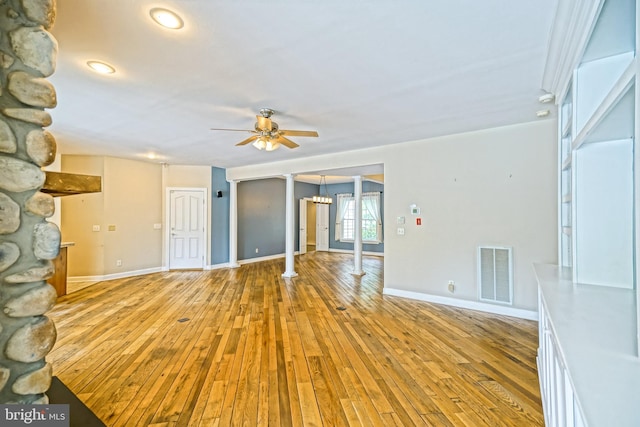 empty room featuring ceiling fan and light wood-type flooring