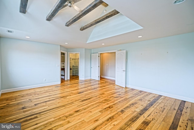 spare room featuring ceiling fan and light wood-type flooring