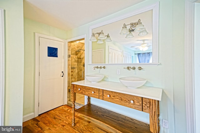 bathroom featuring vanity and hardwood / wood-style floors