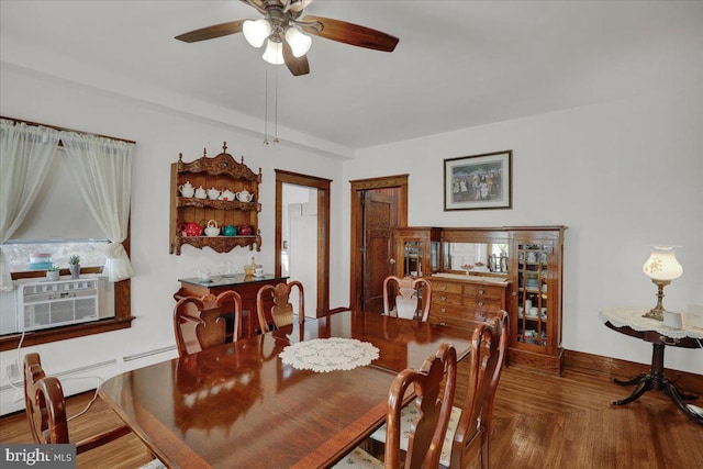 dining area featuring wood-type flooring, ceiling fan, and cooling unit