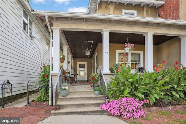 entrance to property with a porch