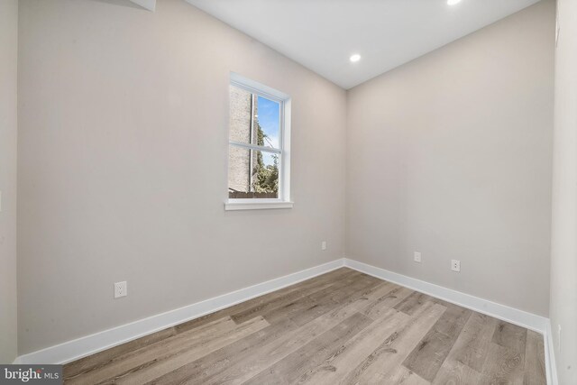 unfurnished room featuring light hardwood / wood-style floors