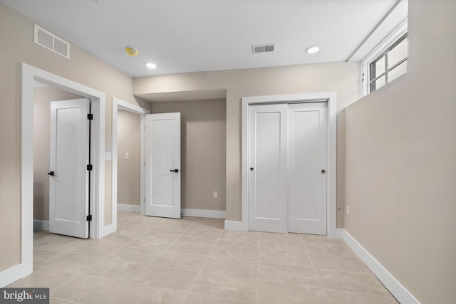 unfurnished bedroom featuring a closet