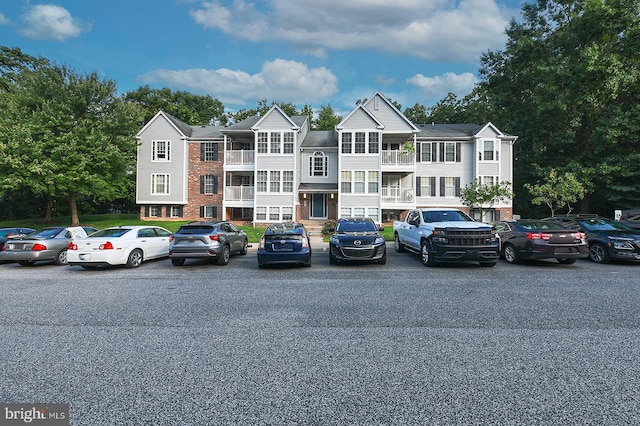 view of front of property with a balcony