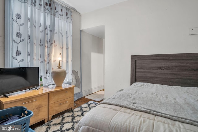 bedroom featuring hardwood / wood-style floors