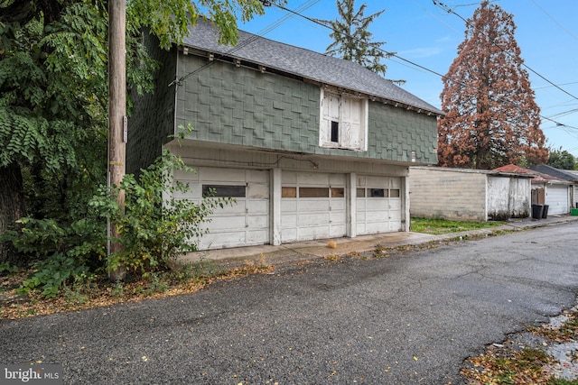 exterior space with a garage