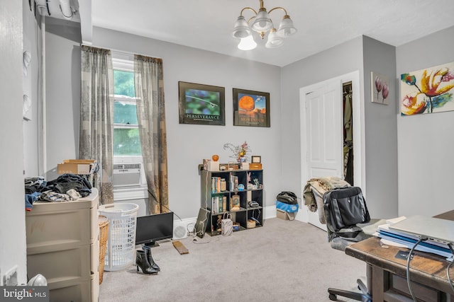 home office featuring carpet floors, cooling unit, and an inviting chandelier