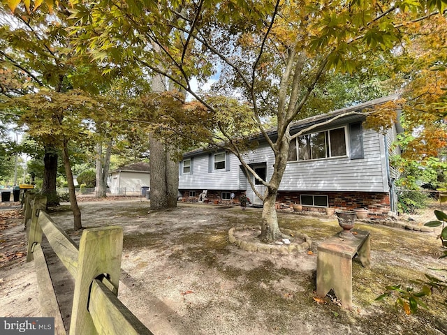 bi-level home with fence