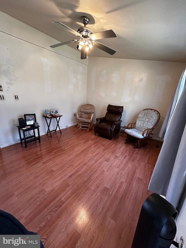 sitting room featuring ceiling fan and wood finished floors