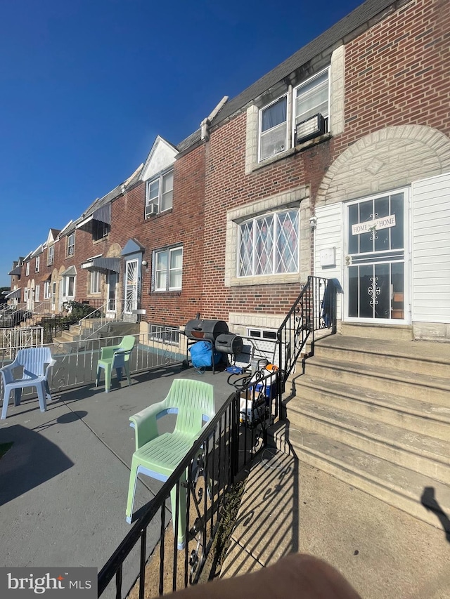 view of patio featuring a grill