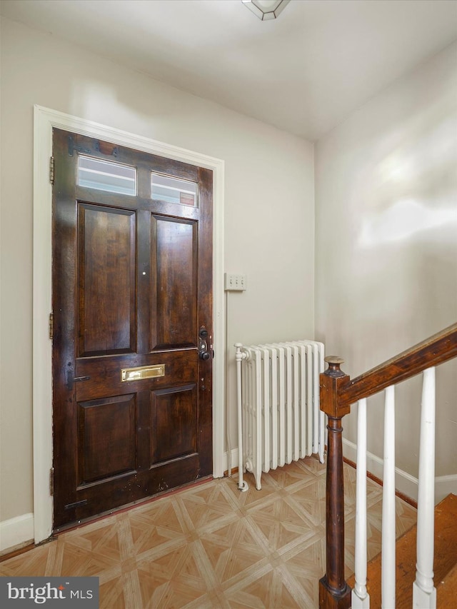 120 E Irvin Ave, Hagerstown, MD 21742 - foyer featuring stairs, baseboards, and radiator heating unit
