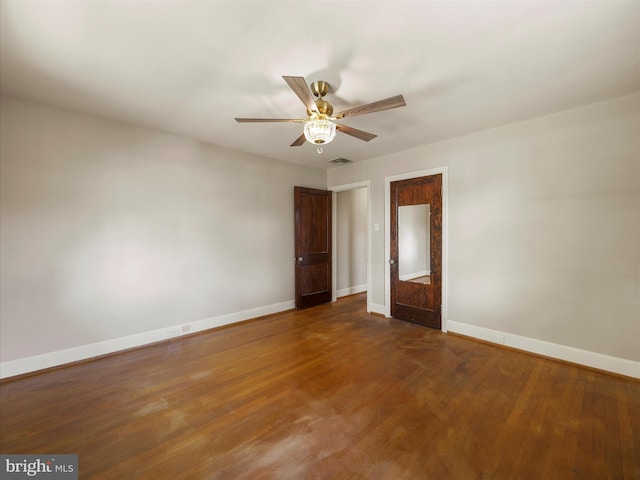 interior space featuring dark hardwood / wood-style floors and ceiling fan