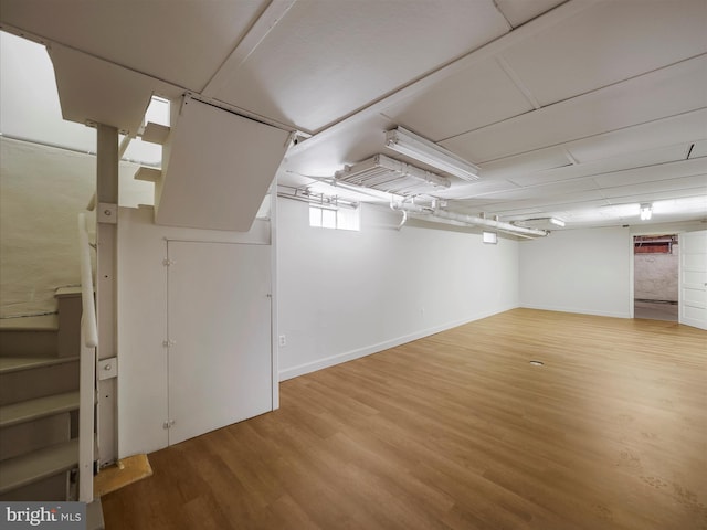 120 E Irvin Ave, Hagerstown, MD 21742 - basement with light wood finished floors, stairway, and baseboards