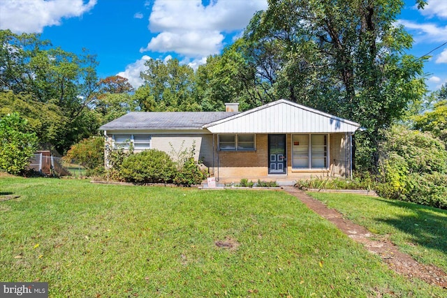 view of front of home with a front yard