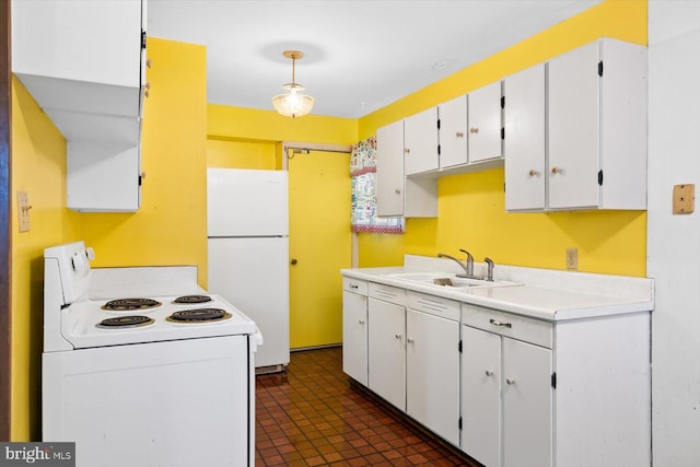 kitchen with pendant lighting, white cabinets, white appliances, and sink