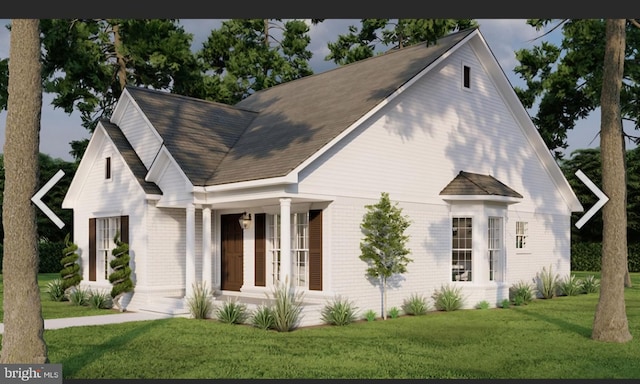 view of front of home with a front lawn