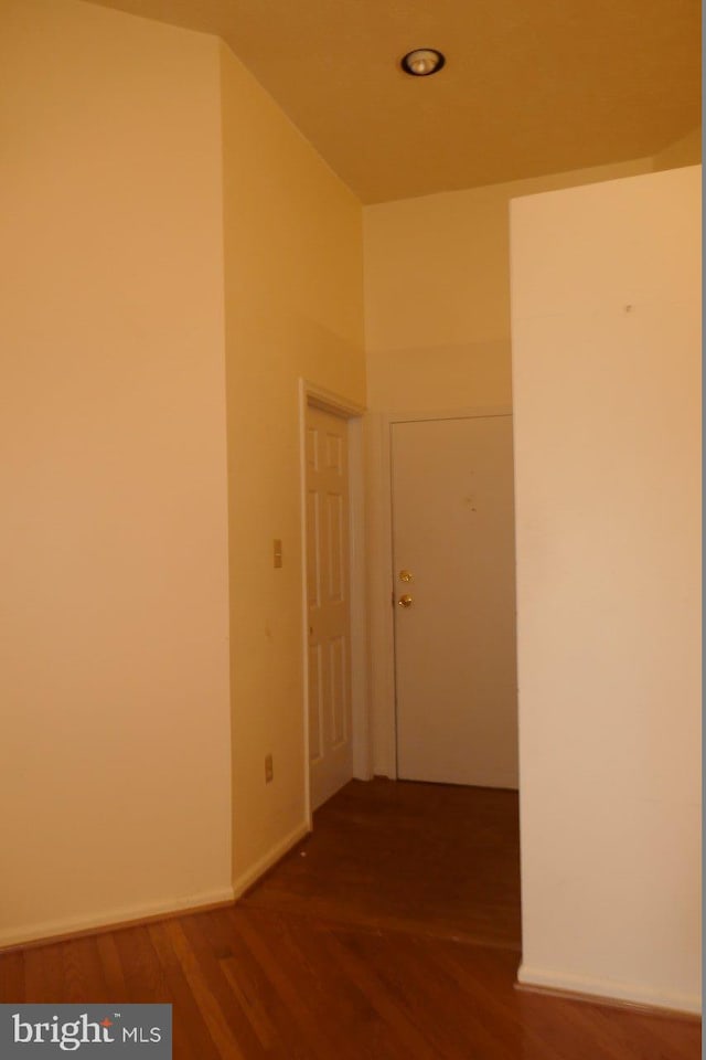 corridor featuring hardwood / wood-style flooring