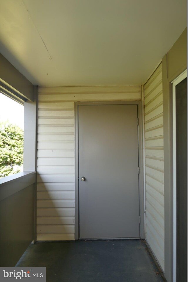 property entrance with a balcony