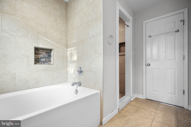 bathroom with plus walk in shower and tile patterned floors