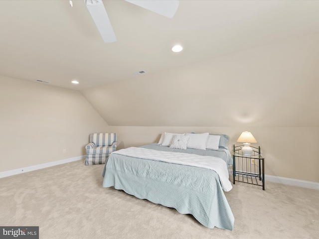 carpeted bedroom featuring vaulted ceiling