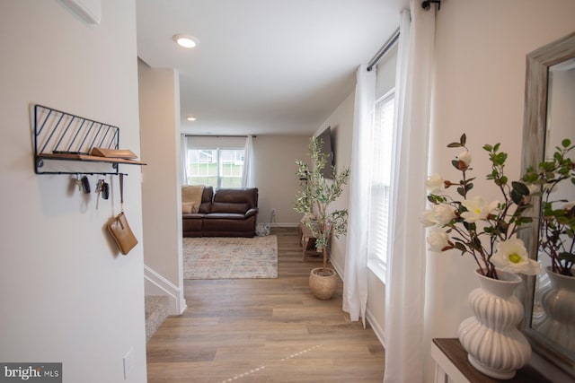 hall featuring light wood-type flooring