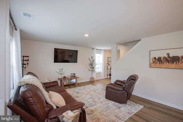 living room with hardwood / wood-style floors