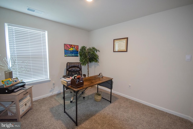 office space with light carpet