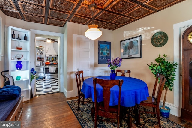 dining space with dark wood-type flooring