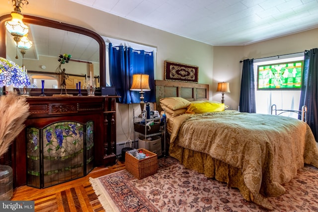 bedroom featuring wood-type flooring