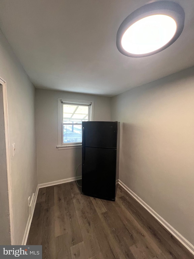 interior space with dark hardwood / wood-style floors