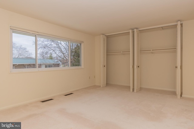 unfurnished bedroom with carpet flooring