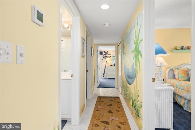 hallway with light tile patterned floors