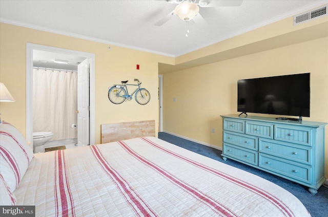 bedroom with ceiling fan, carpet flooring, crown molding, and ensuite bathroom