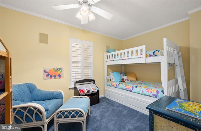 bedroom with a textured ceiling, crown molding, dark carpet, and ceiling fan