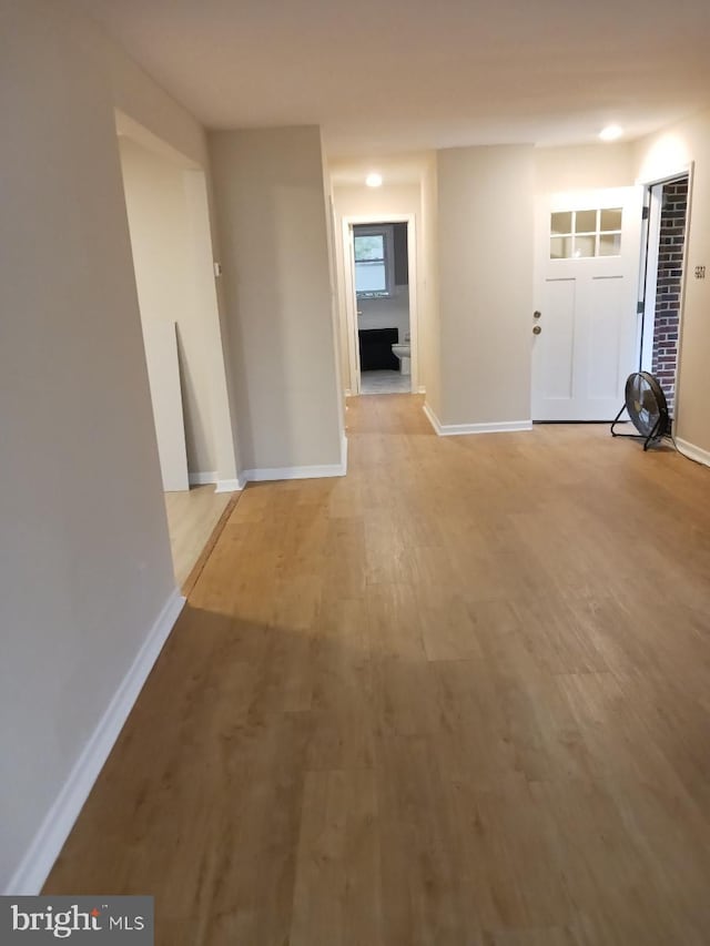 hallway featuring light wood-type flooring