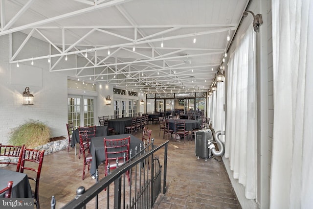 interior space with vaulted ceiling and plenty of natural light