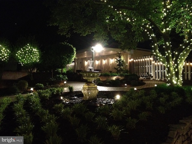 view of yard at night