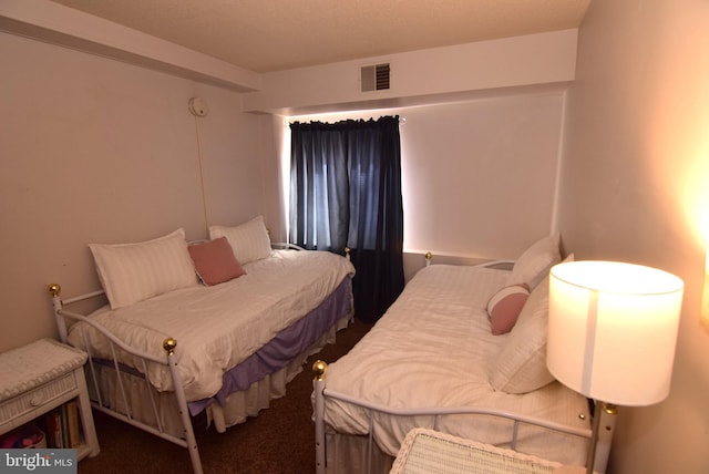 bedroom featuring carpet