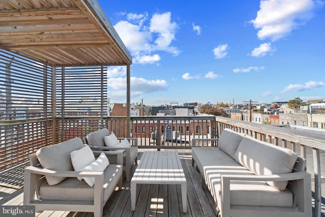 wooden deck with an outdoor hangout area