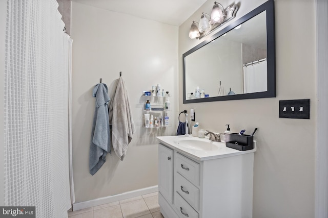 bathroom with vanity and tile patterned floors