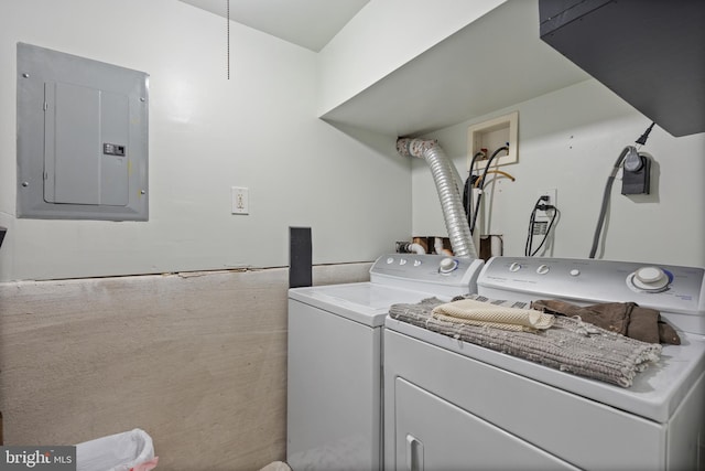 clothes washing area featuring washing machine and dryer and electric panel