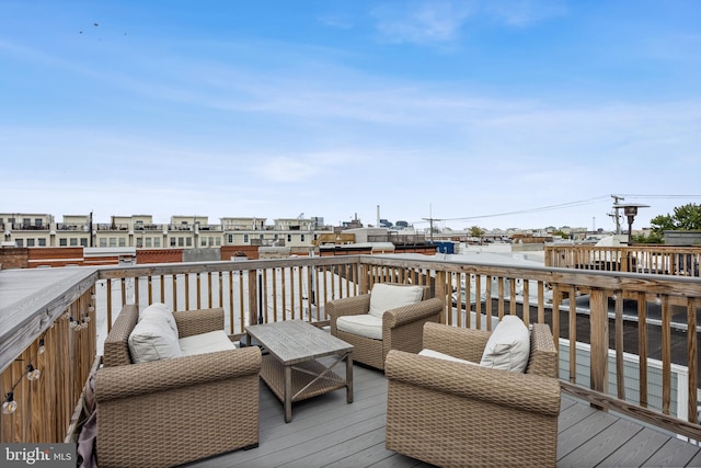 wooden deck featuring an outdoor living space