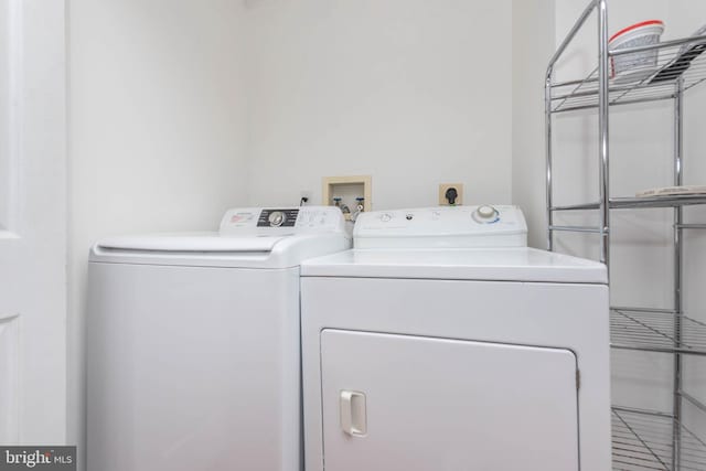 laundry area with washer and dryer