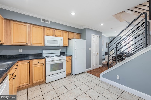 kitchen featuring ornamental molding, white appliances, and light tile patterned flooring